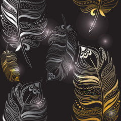 Texture with gold and silver feathers on a black background