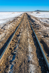 Fototapeta na wymiar The railroad at lake Baskunchak.