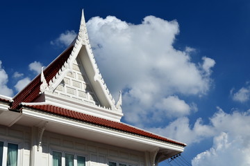 Thai House Roof on blue sky background.