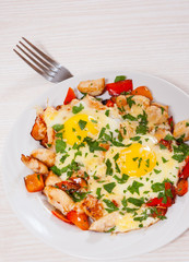 fried eggs with chicken breast, pepper and cheese