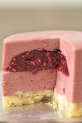 Raspberry white chocolate on gold plate strawberry on top