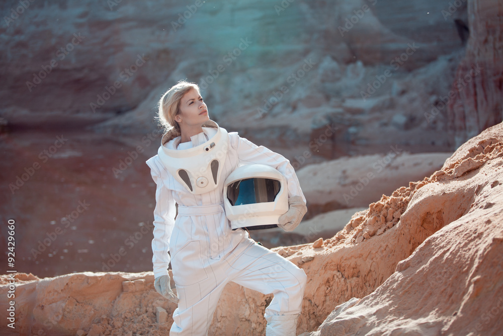 Canvas Prints futuristic astronaut without a helmet on another planet, image
