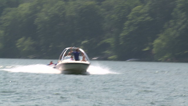 Motor boat pulling a float