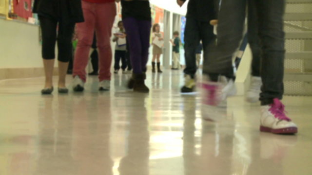 Grammar School Students Walking Down The Hall