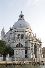 Fototapeta na wymiar The Basilica Santa Maria della Salute, built in baroque style, on Grand Canal in Venice, Italy