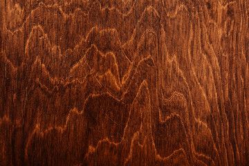 Dark grungy plywood background texture