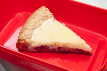 piece of cut cherry pie with selective focus