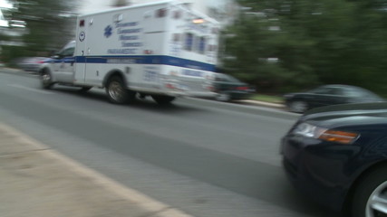 Ambulance with lights flashing