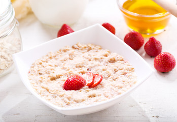 bowl of porridge with strawberry