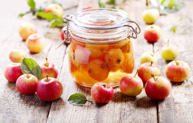 jar of apple jam with fresh fruits