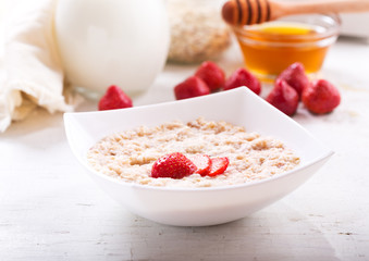 bowl of porridge with strawberry