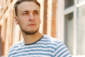 Portrait of a young man with a beard