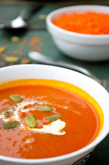 Vegetarian pumpkin-lentils cream soup with pepo seed