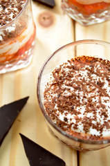 thick Greek yoghurt with cranberry dip and chocolate curls