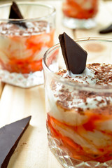 thick Greek yoghurt with cranberry dip and chocolate curls