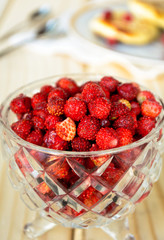 Fresh wild strawberries and pancakes