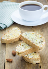 Traditional Italian homemade biscotti with almond and cup of coffee