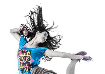 Teenager girl jumping in street dance style