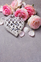Decorative heart and pink roses