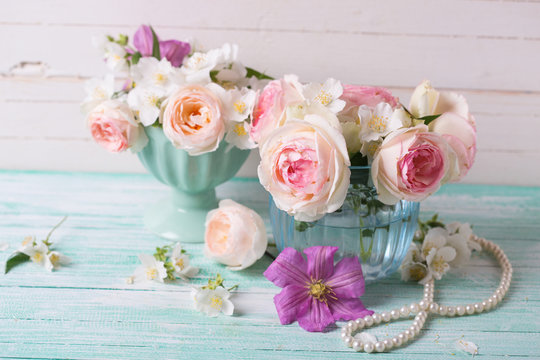 Fresh roses, jasmine and clematis flowers