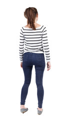 Fototapeta premium back view of standing young beautiful woman. 