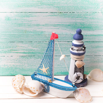 Decorative lighthouse, sailing boat and marine items