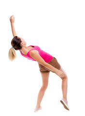 Fototapeta premium Balancing young woman. or dodge falling woman.