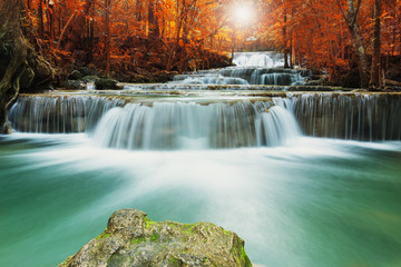 Waterfall Huay Mae Kamin, beautiful waterfall in autumn forest,