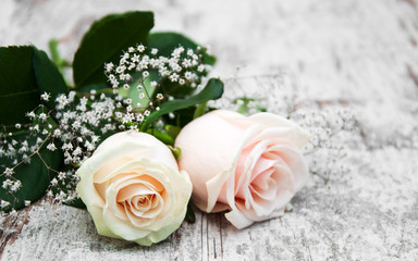 Roses on a wooden table