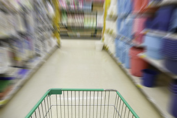 cart in blurry defocused supermarket