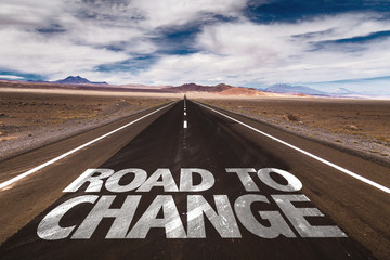 Road to Change written on desert road