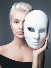 blond lady with mask