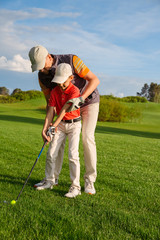 Father with son at golf