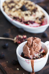 Crumble BlackBerry with chocolate and chocolate ice cream, a small depth of field.selective focus