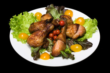 Photo of chicken thighs in honey sauce on a lettuce leaf