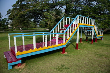 Obraz na płótnie Canvas Colorful wooden bridge in playground