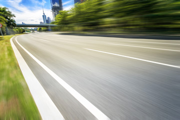 empty asphalt road in modern city