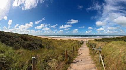 coast and beach with blue sky near domburg, netherlands