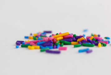 colourful sprinkles on a white background 