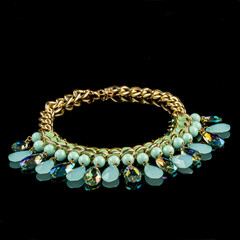 necklace on a black background
