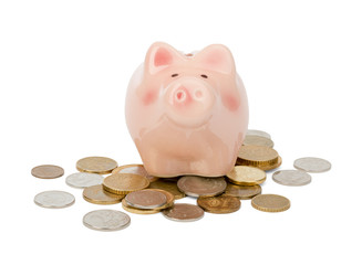 Piggy bank on coins, front view