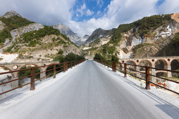 Landscape of Carrara's marble quarry in Tuscany (Italy) with the distinctive bridge in the locality...