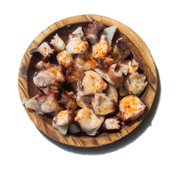 Pulpo on wooden plate