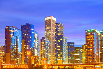 Fototapeta na wymiar Chicago Illinois, USA Skyline of downtown modern illuminated buildings at sunset