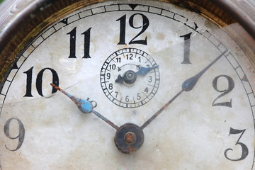 The dial of the old clock close up