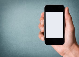 Holding phone.
