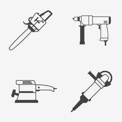 Set of power electric tools monochrome icons. Chainsaw, hand drill, sander and angle grinder.