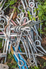 lots of big old screws on the ground