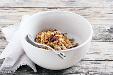 Homemade granola with nuts and dried cranberry.Selective focus