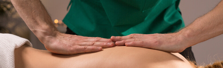 Back massage in spa center